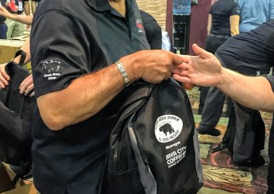 Bob with Java City backpacks