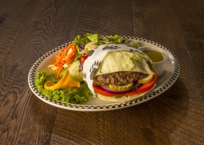 Burger Wrapped In Lettuce and Side Salad