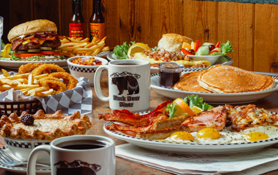 Plates of food showing breakfast and lunch entrees.